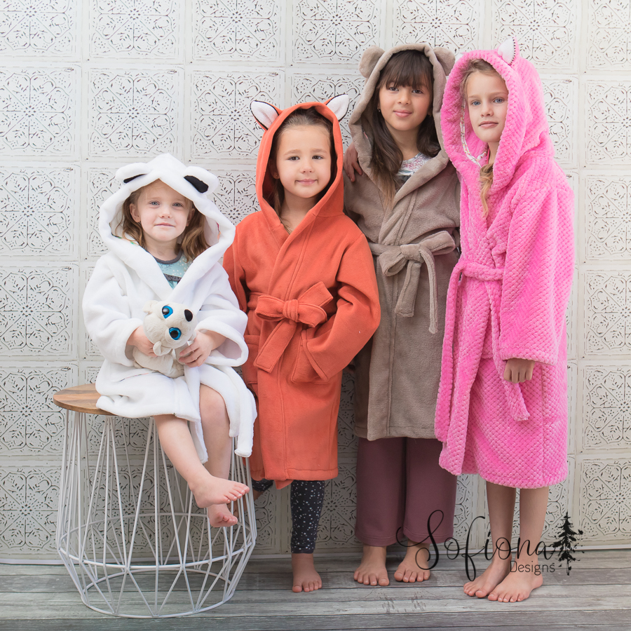 Arctic Fox housecoats with fox, bear, and rabbit ears. Mid and long length. Pockets. Made for warm fleece robes.