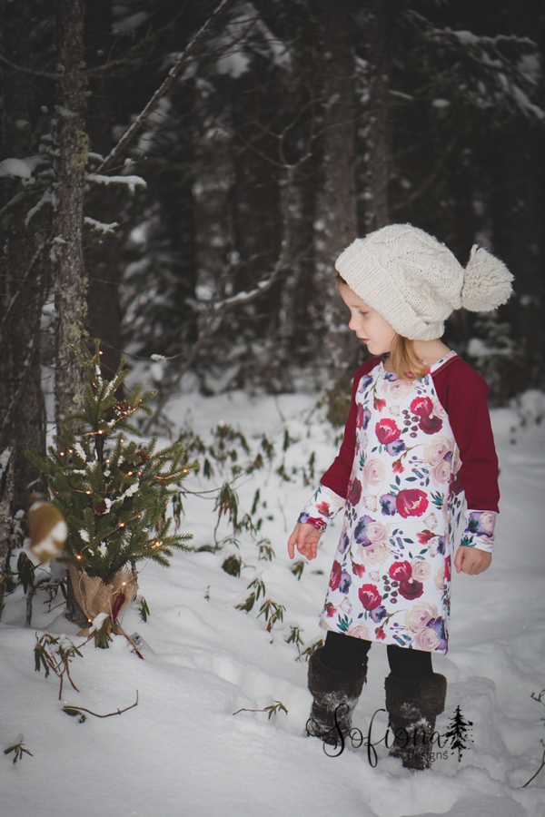 Aurora dress length with long sleeves and long banded hem on the sleeves. Sweater dress for cold weather.