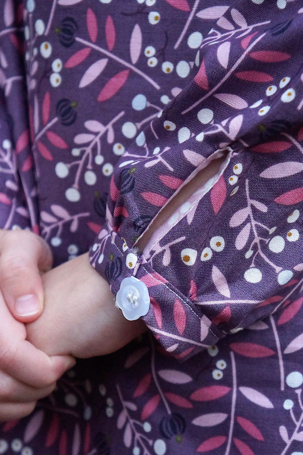 The cold shoulder Lynx with long sleeves and button closure option.