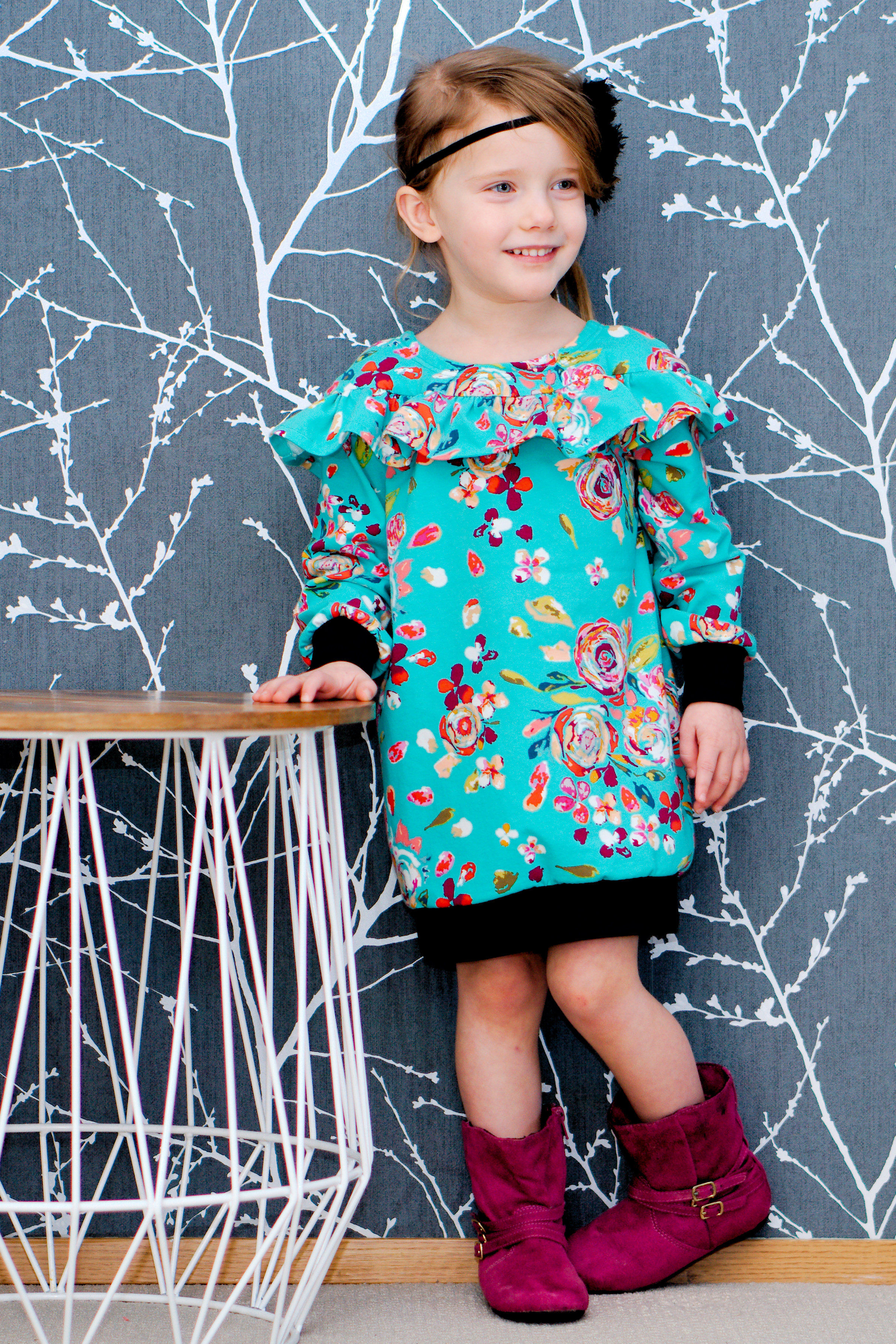 Rhubarb dress length with dropped shoulder and longer ruffled yoke. Knit fabric from Art Gallery Fabrics.