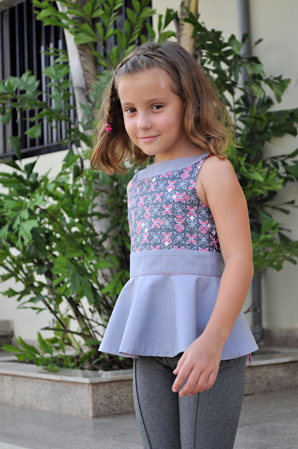 Juniper bow back top with tuxedo style bow. Circle peplum. Reversible shirt for everyday or special occasions. 