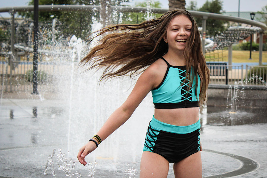 Narwhal 2-piece swimsuit. Criss criss details on top center and sides of bottoms.