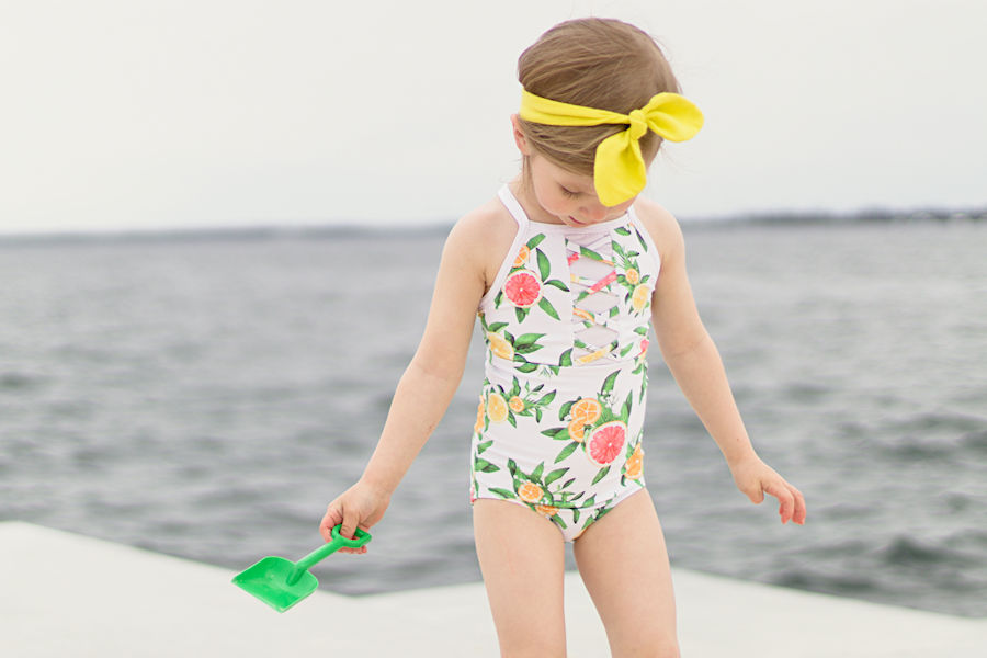 Criss cross top on the one piece Narwhal Swimsuit.