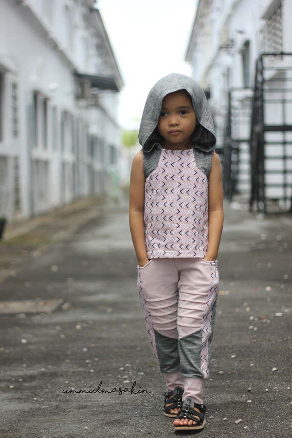 Moss knit shirt with angled bodice detail. Optional oversized hood with a V neckline in the back. Pairs perfectly with the Railway joggers.