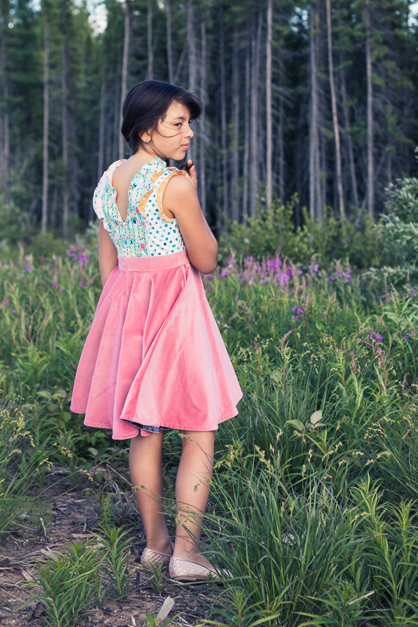 A special occasion Fireweed Dress with all flounces and a circle skirt. Invisible zipper back.