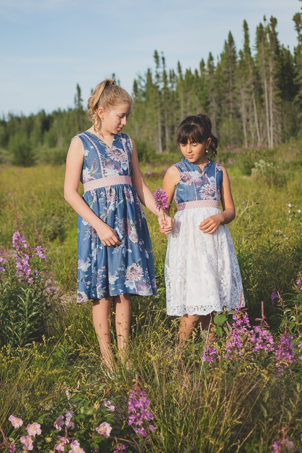 A pair of Fireweed dresses with gathered skirt. Optional flounces allow for different looks.