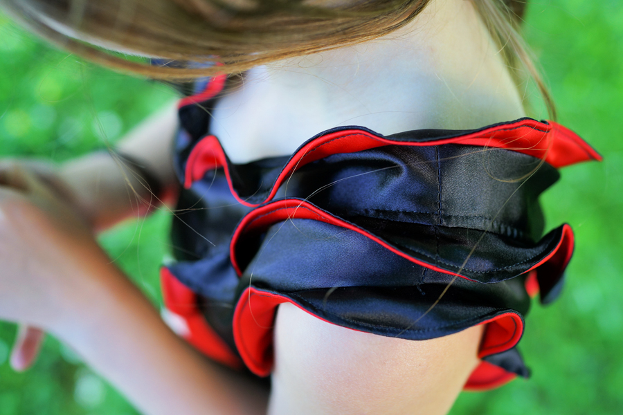 Fireweed Flounce Dress as a special occasion dress and lined with a pop of colour under the ruffles.