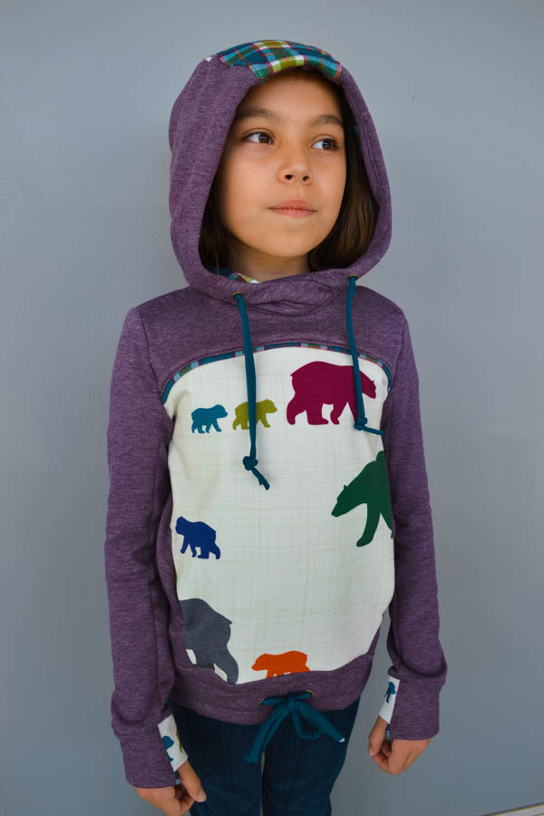 Bonfire Hoodie with 2 piece sleeves, hidden pocket, gusseted hood, unique thumbholes and a slight high low band on the hip.