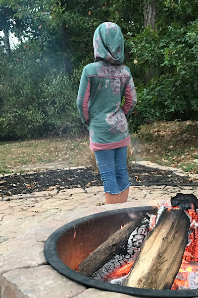 Bonfire Hoodie with 2 piece sleeves, gusseted hood and a slight high low band on the hip.