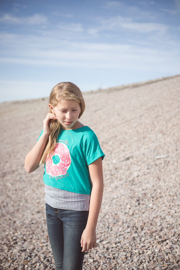 Tundra top with facing along the  armscyes creating short sleeve look. Cropped version looks great over a tank top like the Dandelion.