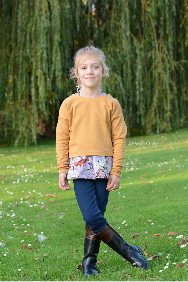 Tundra Sweater in waist length and long sleeves. Faced neckline.