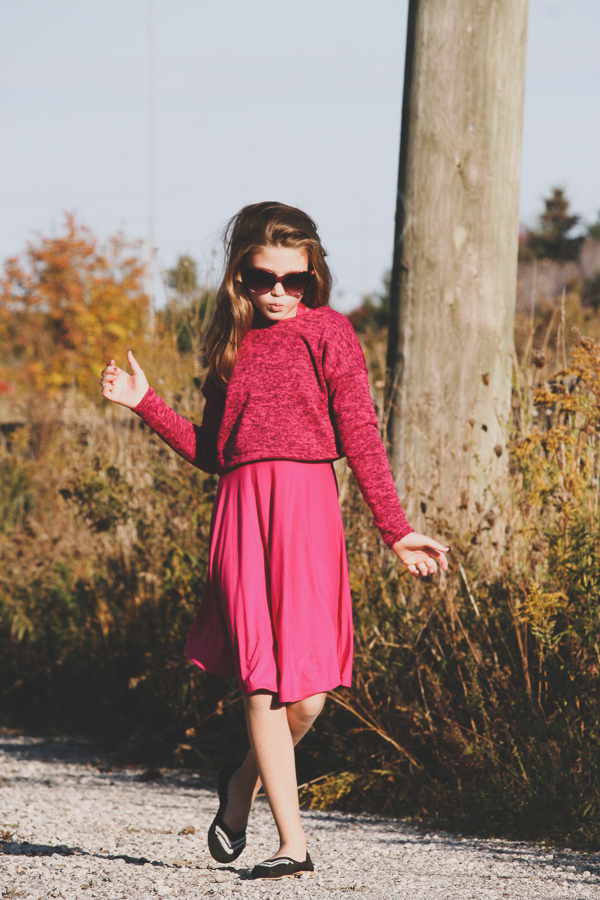 Tundra sweater in waist length and long sleeves and using sweater knit fabric. Shown over the Tide Halter dress.