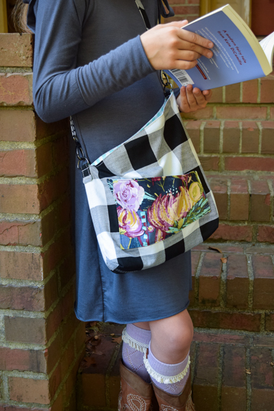 The Balsam Bag fundraising bag for A21. Envelope corners, angled top, cross body strap and front pocket. Perfect for teens, tweens, girls.
