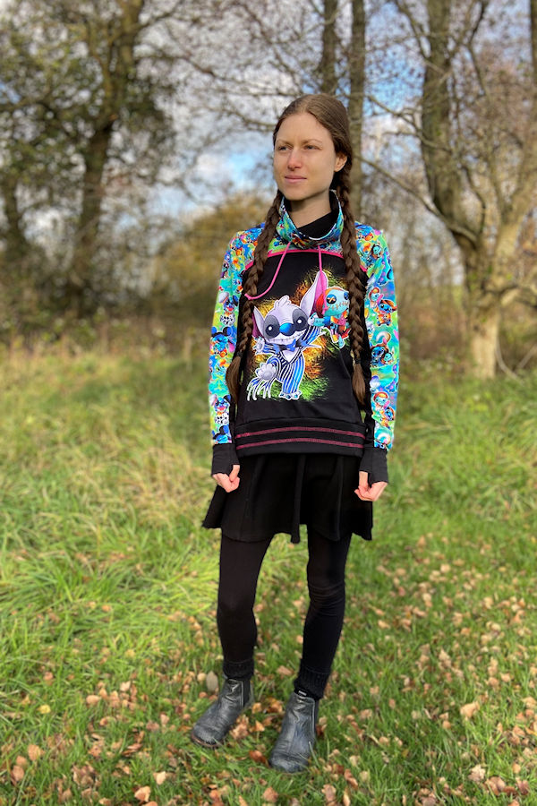 Miss Bonfire Hoodie with a hacked cowl neck option. 2 piece sleeves, hidden pocket and a slight high low banded hem. Optional drawstrings and thumbholes. 