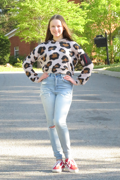 Clover Hoodie by Sofiona Designs. Waist length. Long sleeves with welt zipper pocket and hood.