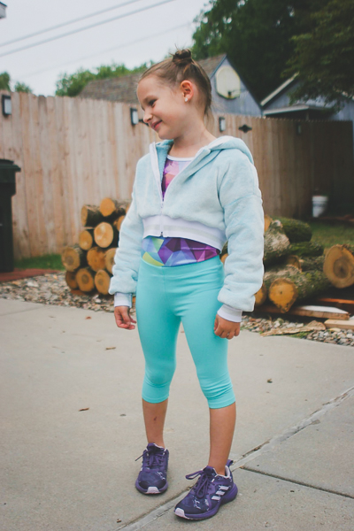 The Rose Hip cropped jacket in fuzzy faux fur perfect for dance wear.