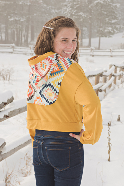 Miss Clover in view B with hood and long sleeves. Junior Miss sizes 0-20 from Sofiona Designs.