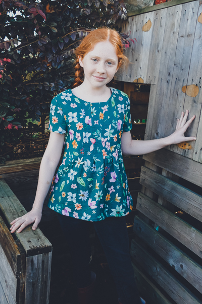 The Haze by Sofiona Designs for girls' sizes 2-16 in the top length and pleated bodice.