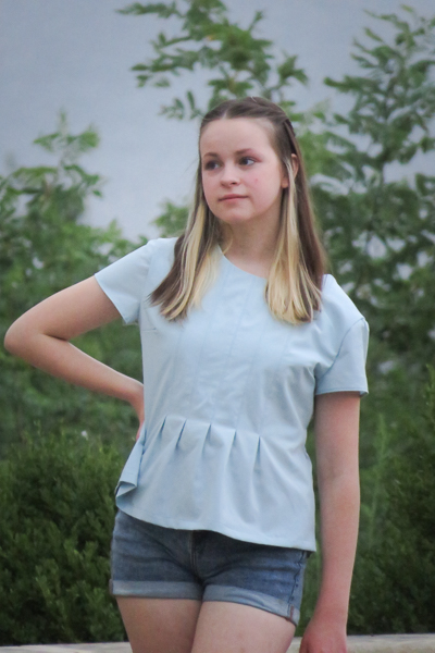The Miss Haze top with pleated bodice and waist ties. Available from Sofiona Designs in junior miss sizes 0-20.