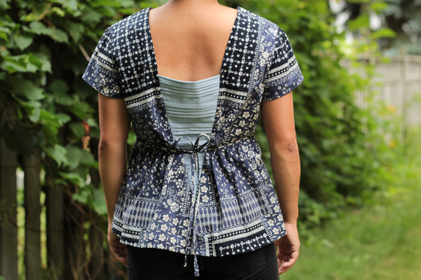 The Miss Haze top with pleated back V section and waist ties. Available from Sofiona Designs in junior miss sizes 0-20.