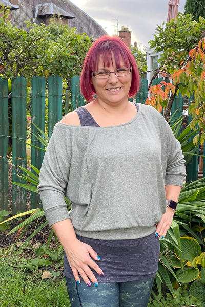 A raglan sweater with batwing sleeves and off shoulder neckline in junior miss sizes 0-20.