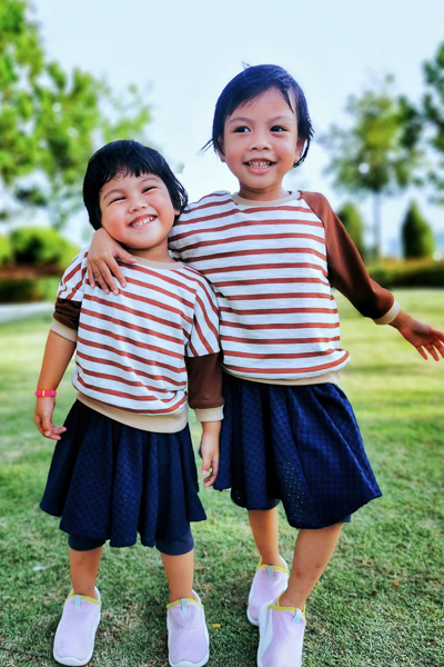 A raglan and dolman combo sweater with 3/4 length sleeves from Sofiona Designs PDF patterns for girls, tweens, teens, and women.