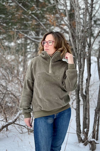 Miss Clover with a half zip funnel neck hack.