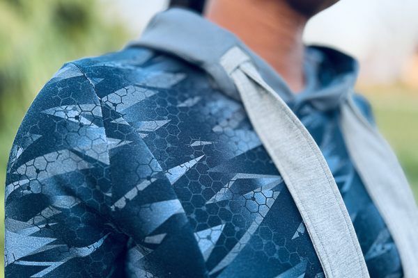 Welt drawstring opening on the Polar sweater dress hood from Sofiona Designs.