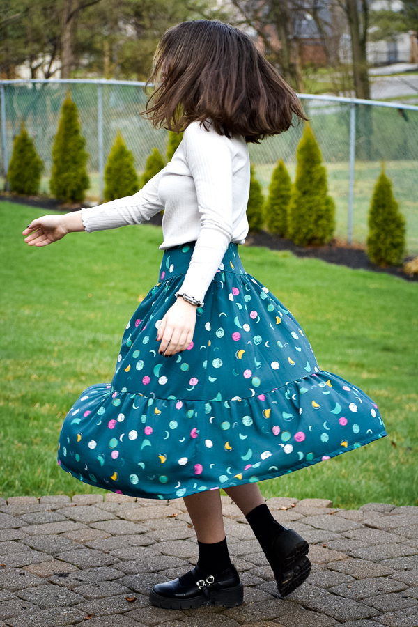 The midi length of the Miss Fern tiered skirt by Sofiona Designs.