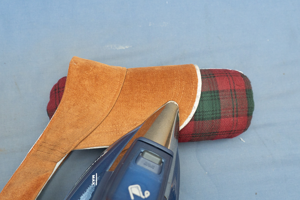 Adding curve to the brim of your hat.