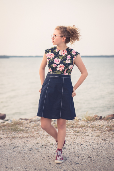 The Miss Forest dress with cap sleeve bodice and center panel skirt.