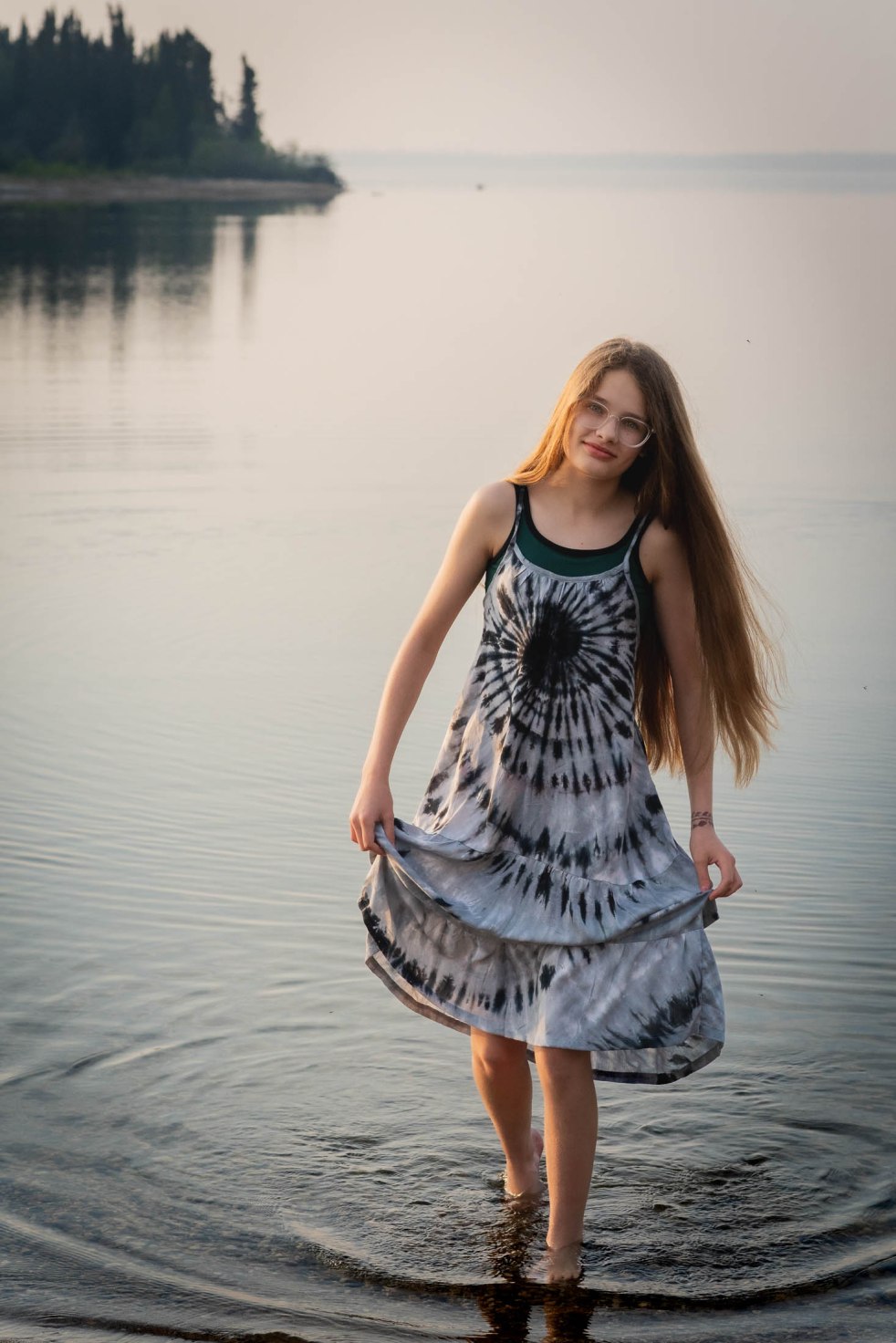 Swim cover dress while walking out of water.